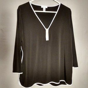 CALVIN KLIEN-XL black with white trim.  Gold zip up front neckline.